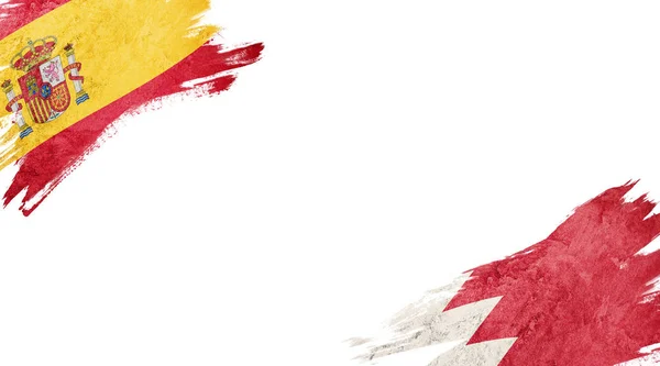 흰색 배경에 있는 스페인 과 웨일스의 깃발 — 스톡 사진